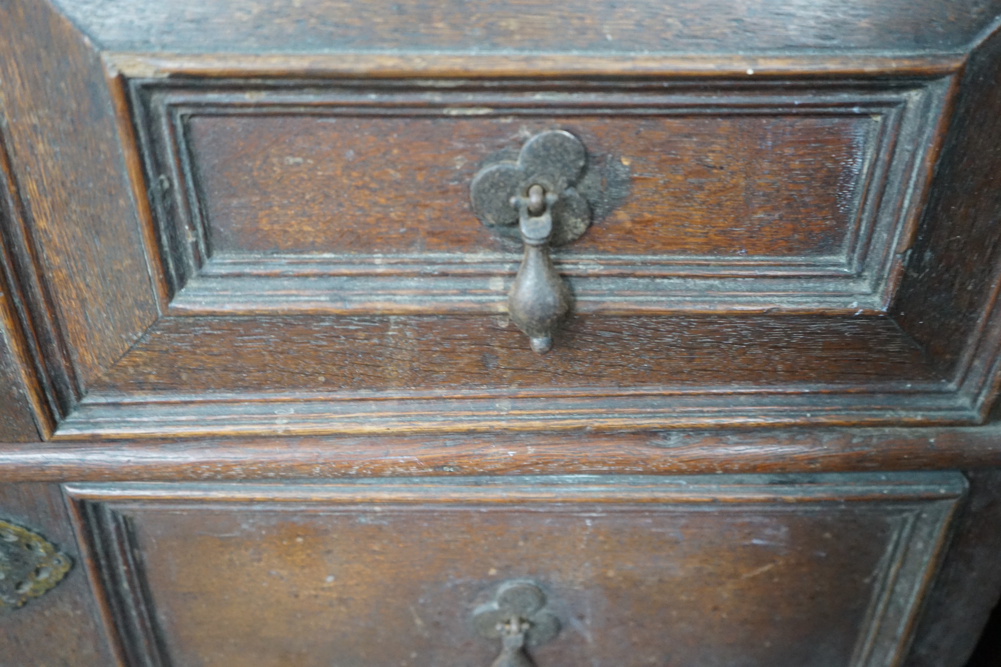 A 17th century oak chest of four drawers, width 93cm, depth 53cm, height 91cm